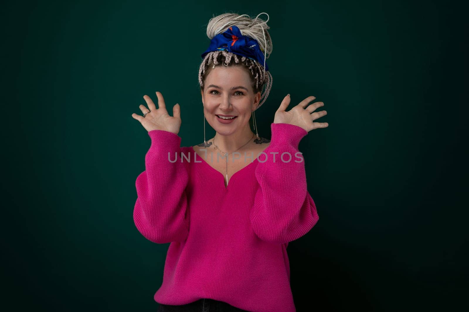 Woman Wearing Pink Sweater and Blue Bow in Hair by TRMK