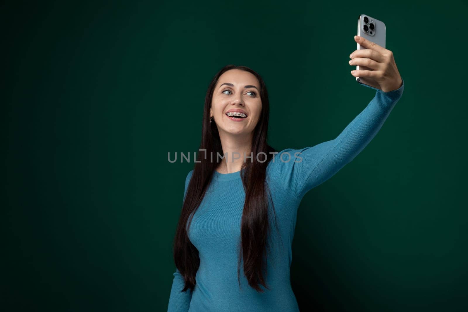 Woman Taking a Selfie With Cell Phone by TRMK