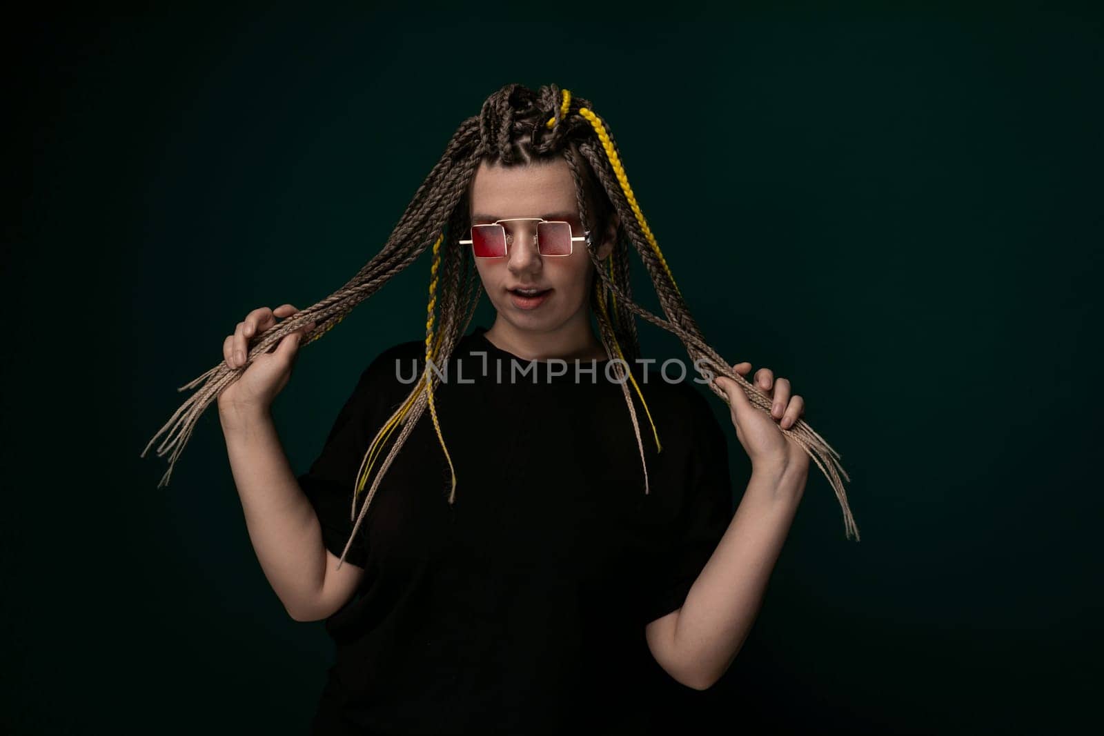 A Man With Long Dreadlocks and Red Glasses by TRMK