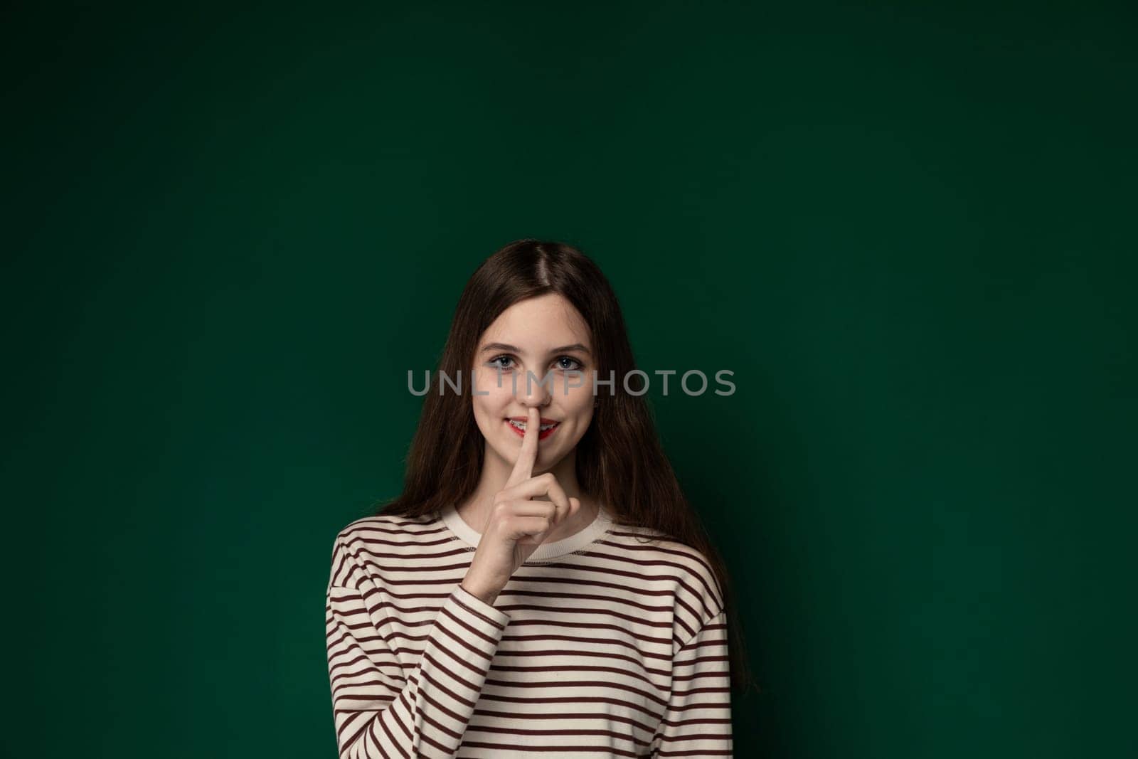 Woman Posing With Finger in Mouth by TRMK