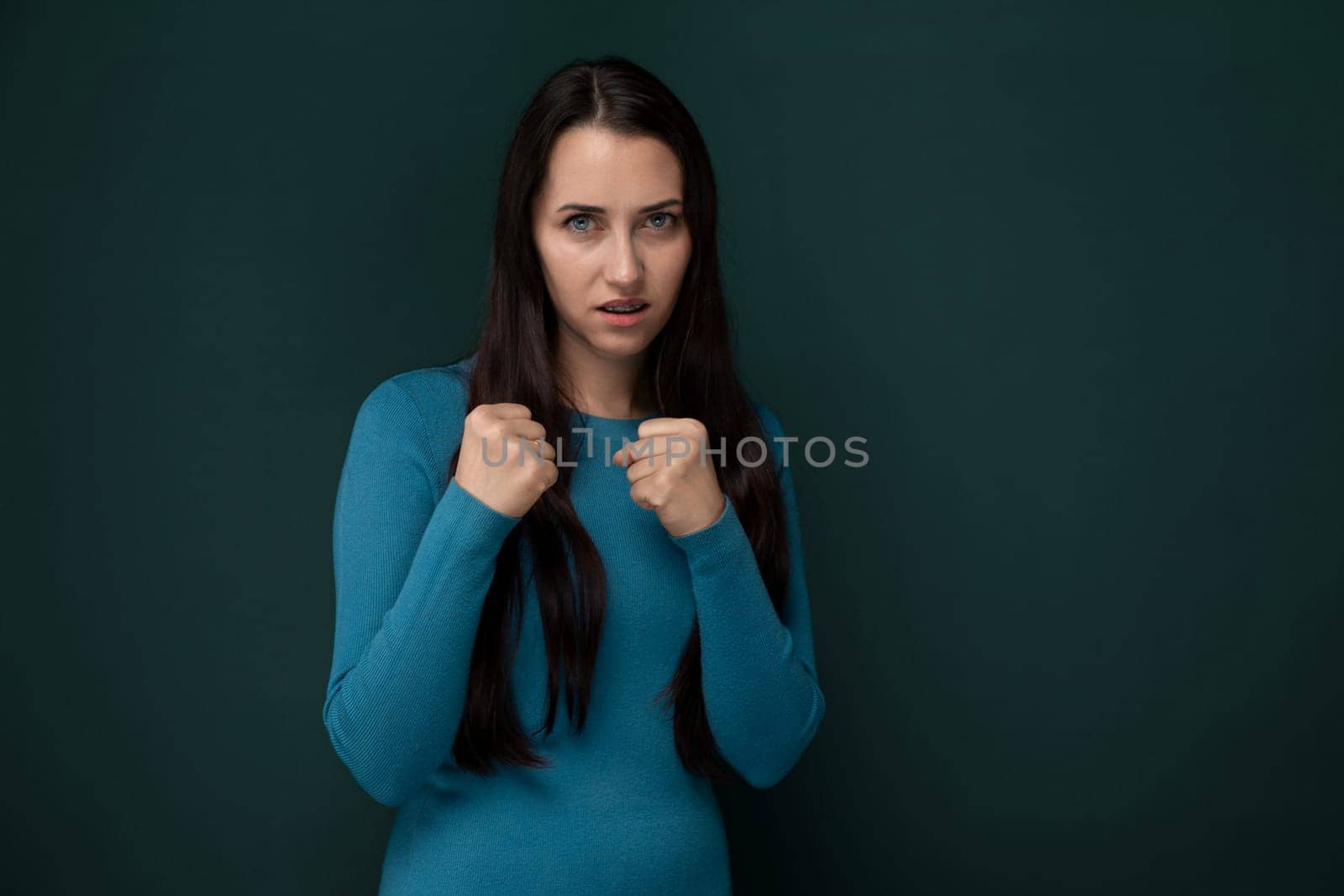 Woman in Blue Dress Posing for Picture by TRMK