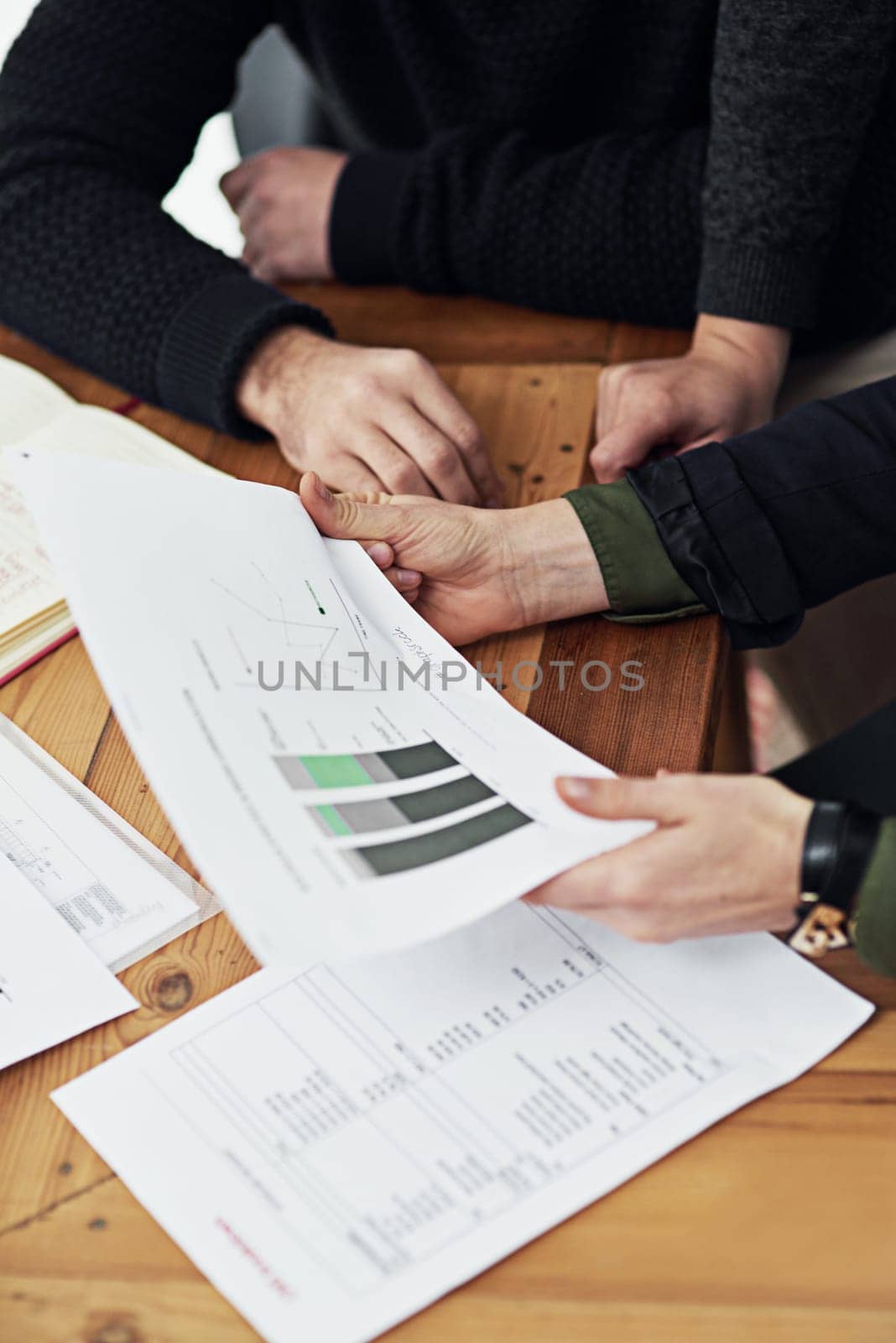 Hands, meeting and documents with graphs for analysis, communication and teamwork, people and financial business growth. Corporate collaboration, paperwork with market statistics and data analytics.