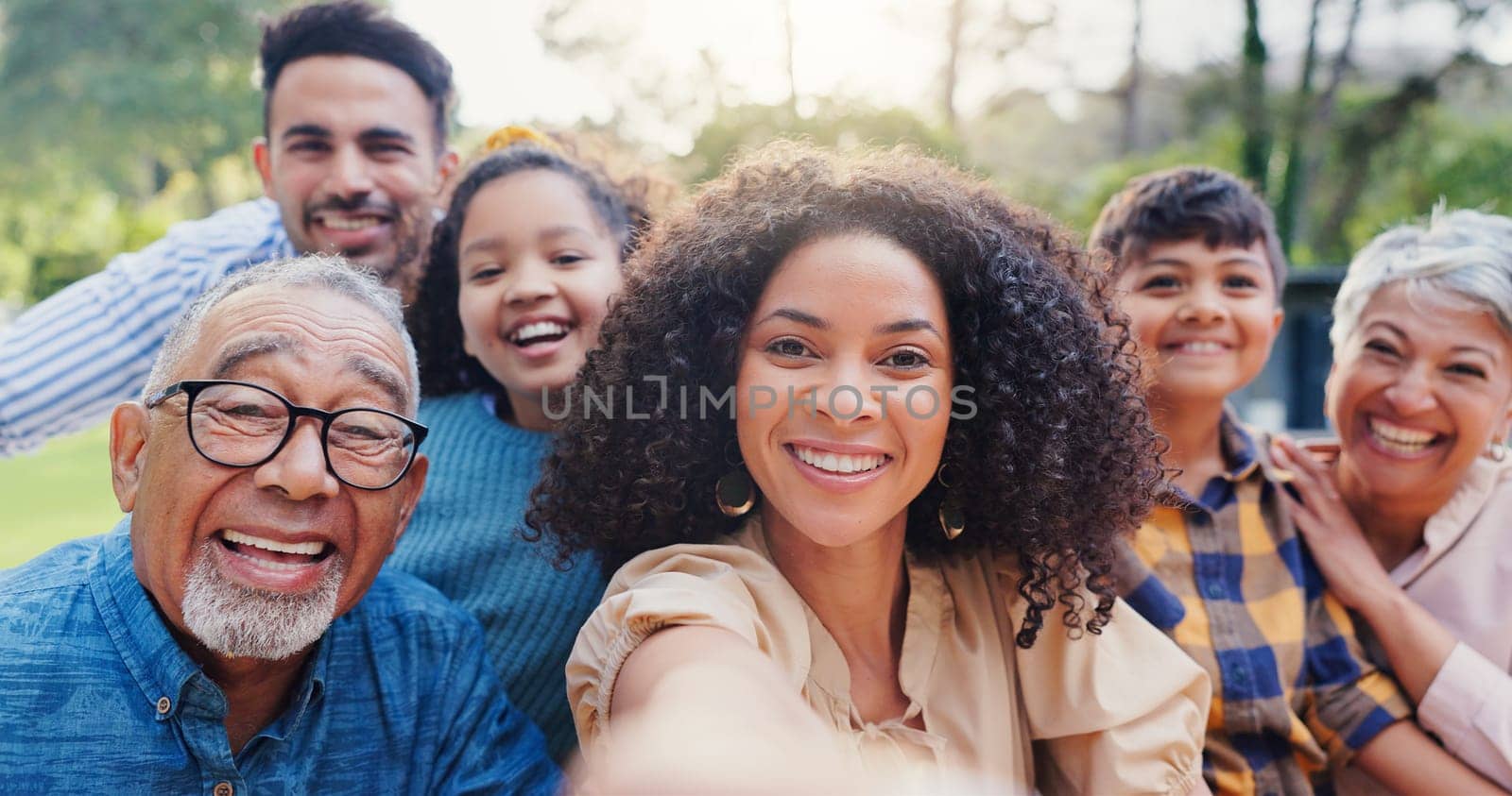 Happy family, face and selfie on garden in nature, generations and love for bonding together on vacation. Parents, kids or elders with care in portrait in countryside, excited or travel for wellness.