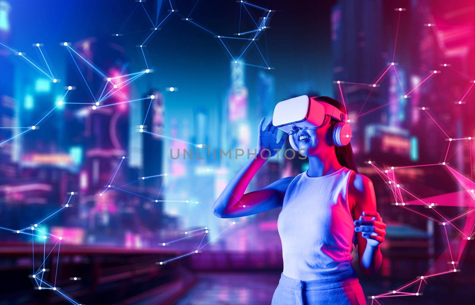 Female standing in cyberpunk style building in meta wear VR headset connecting metaverse, future cyberspace community technology. Woman touching goggle looking far virtual construction. Hallucination.