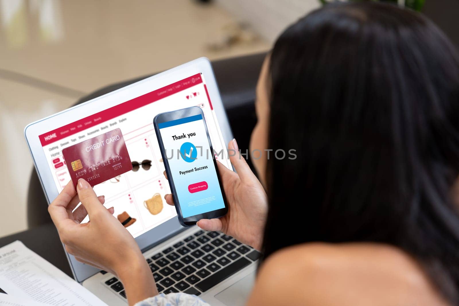 Young woman order or purchase product on internet using laptop and make transaction payment by smartphone. Online shopping lifestyle with credit card via internet banking on mobile application. Blithe