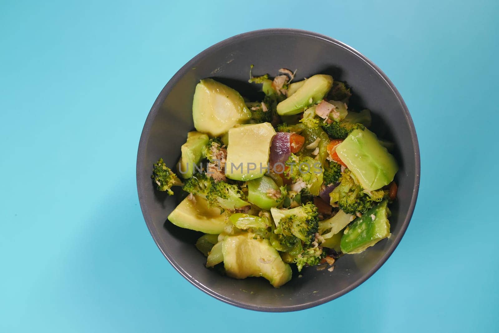 top view of avocado salad in a bowl .