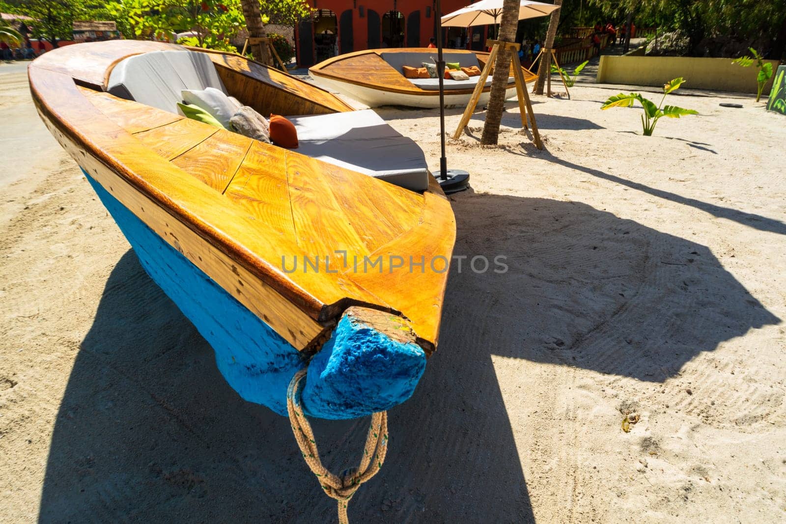 Umbrellas and sunbeds by the exotic tropical beach, Haiti, Caribbean Sea