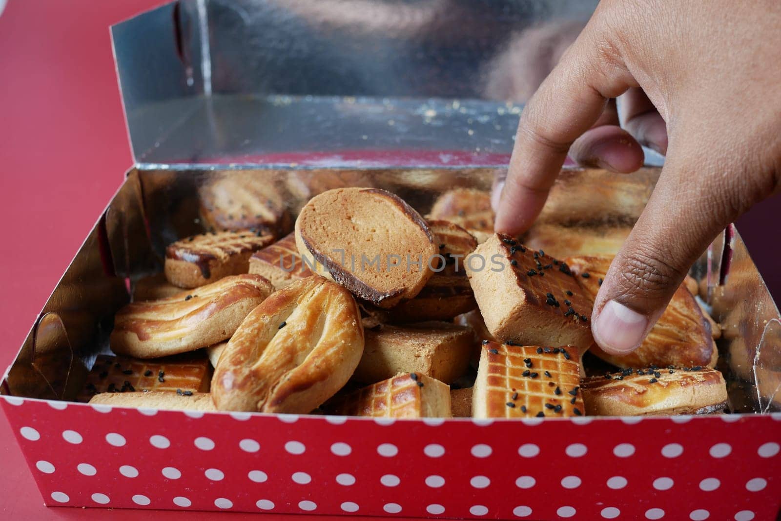 close up of sweet cookies in a packet on table .