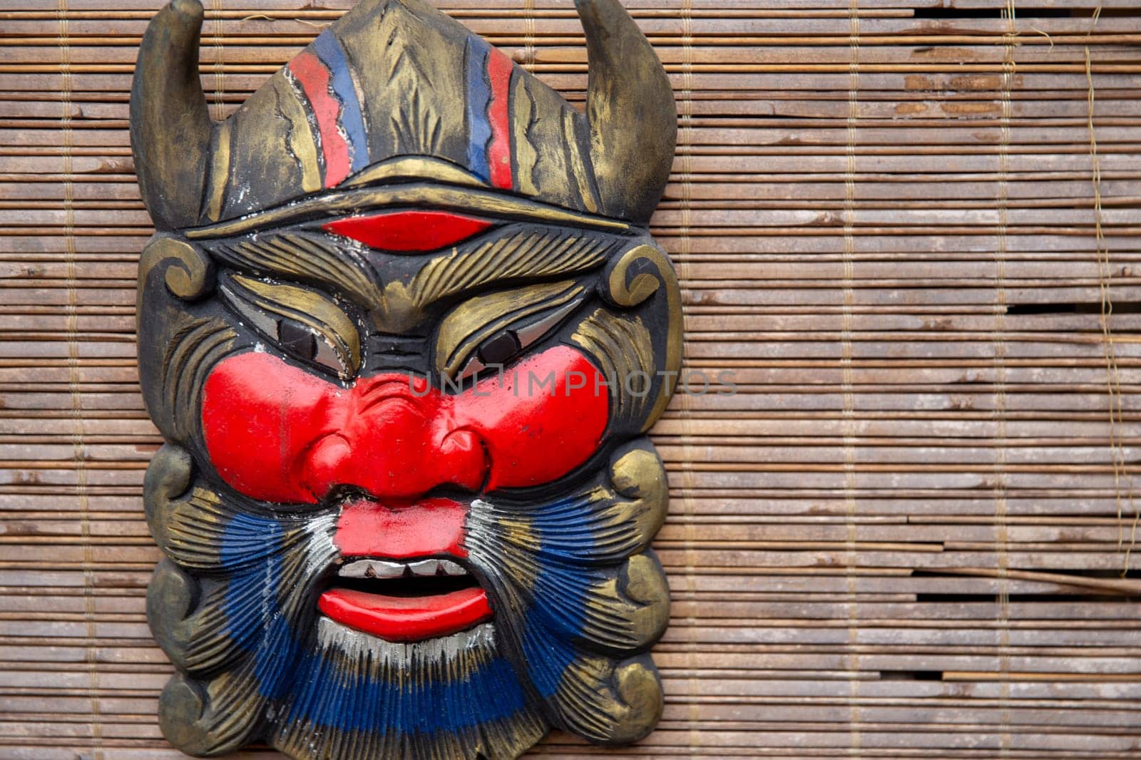 Vietnamese mask on display with room for text