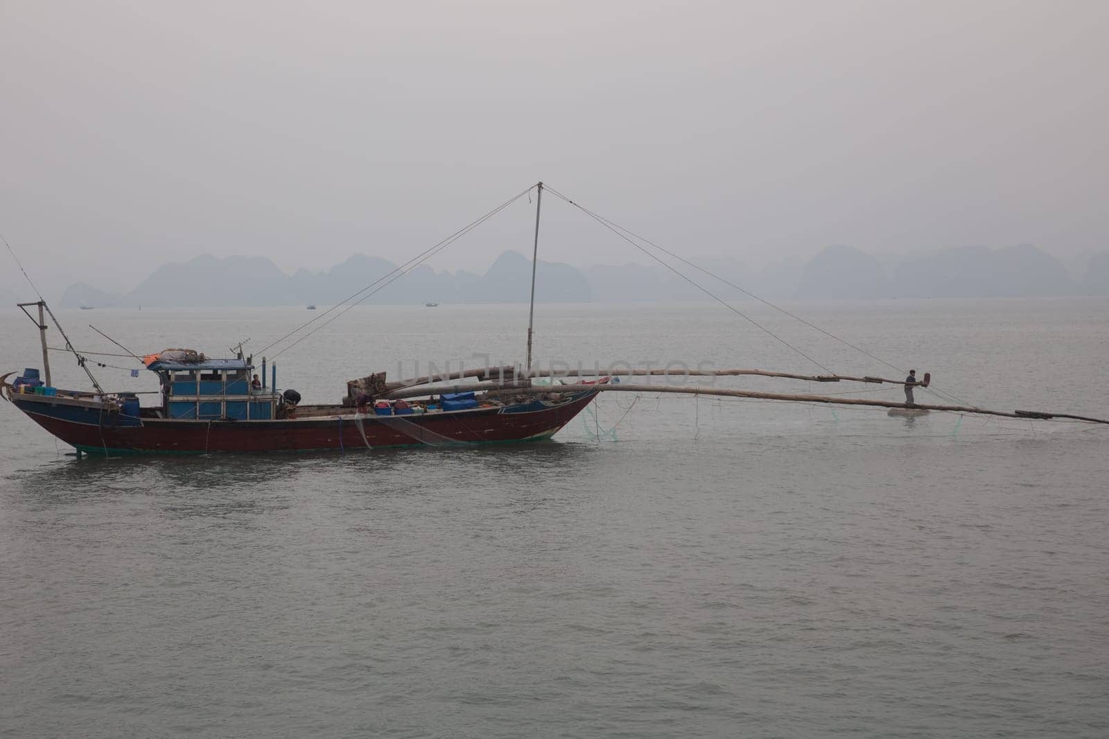 A traditional vietnamese fishing boat in Halong Bay