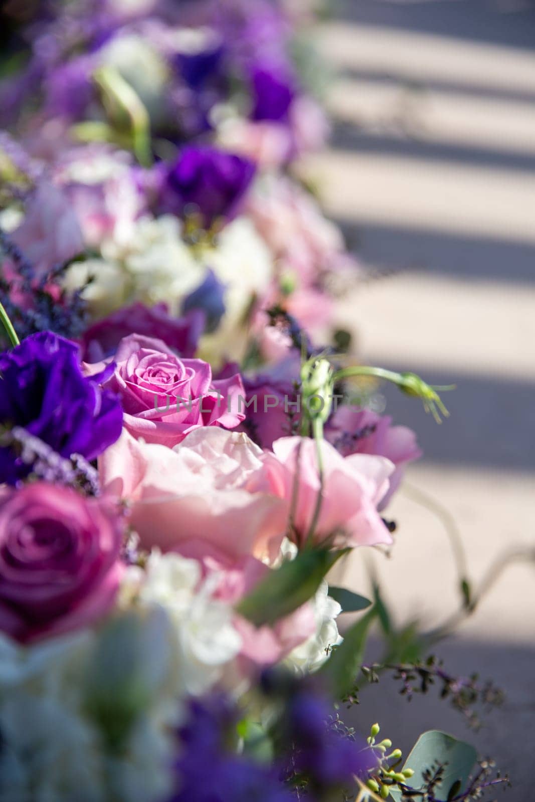 Wedding Aisle flowers attached to chairs