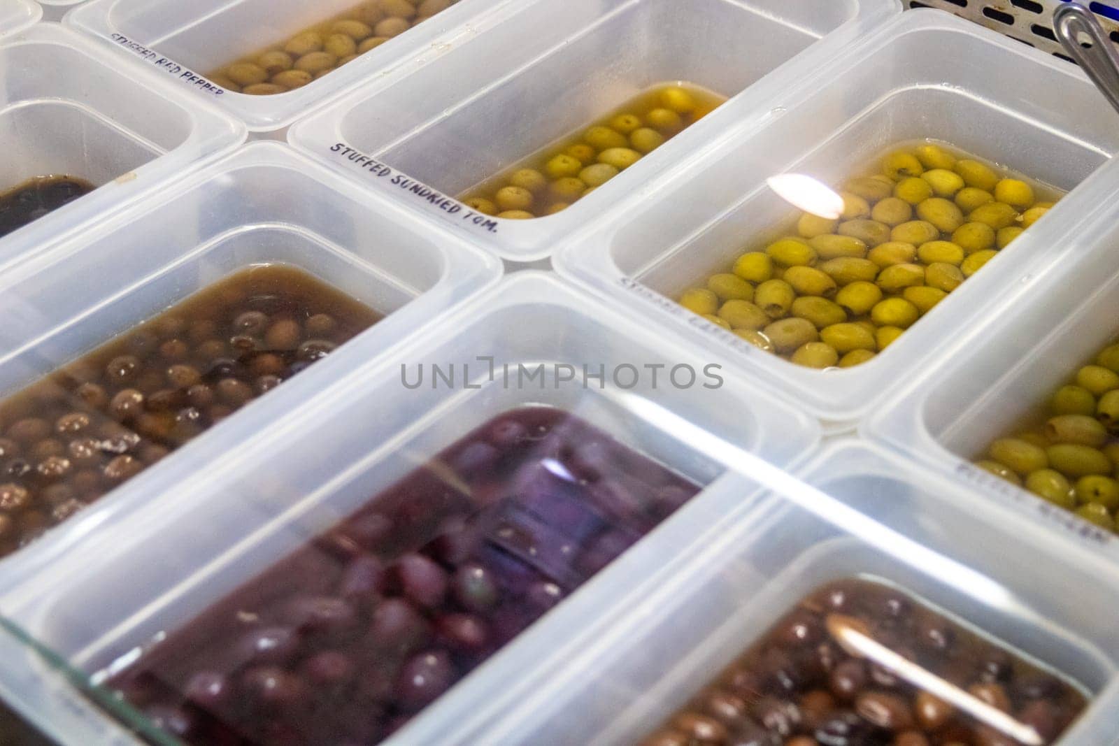 A Self Serve Olive Bar with different choices