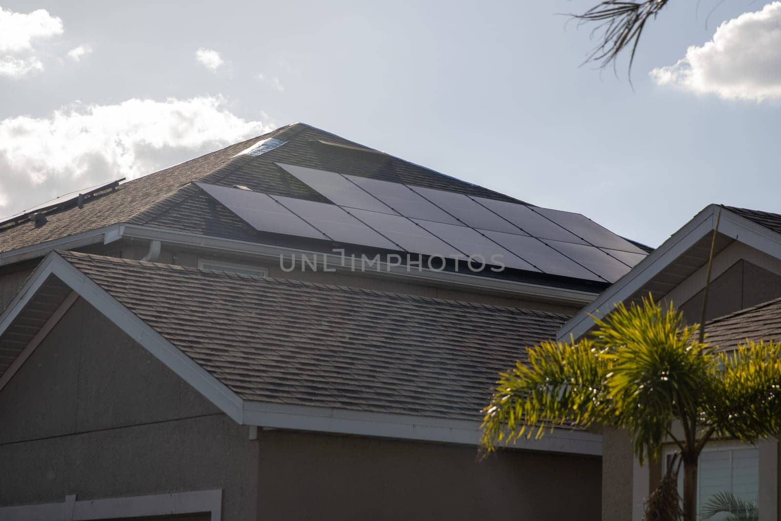 Home with Solar Panels attached to a roof