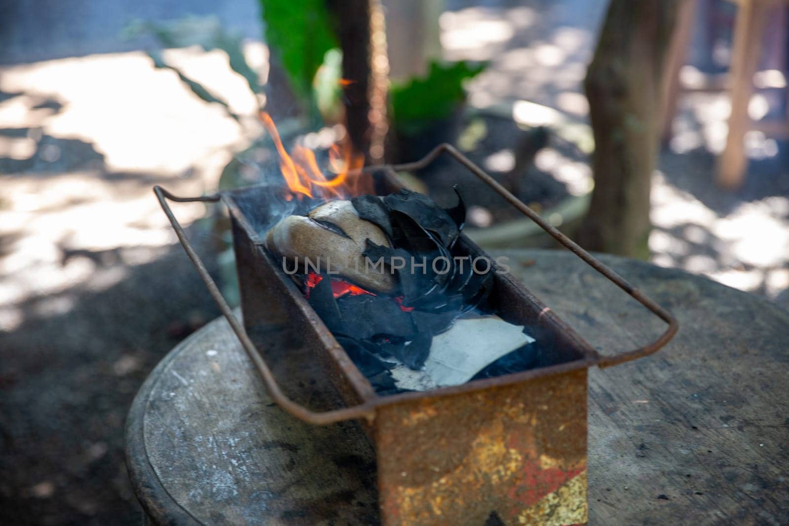 Traditional Balianese Coconut Grill with flames