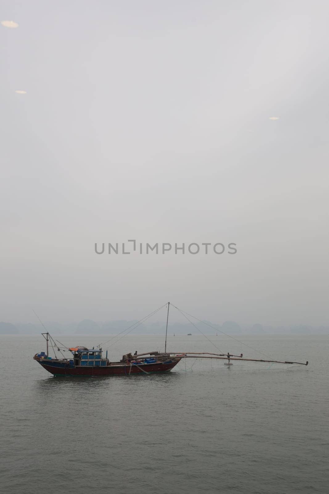 Traditional Vietnamese fishing boat on the bay