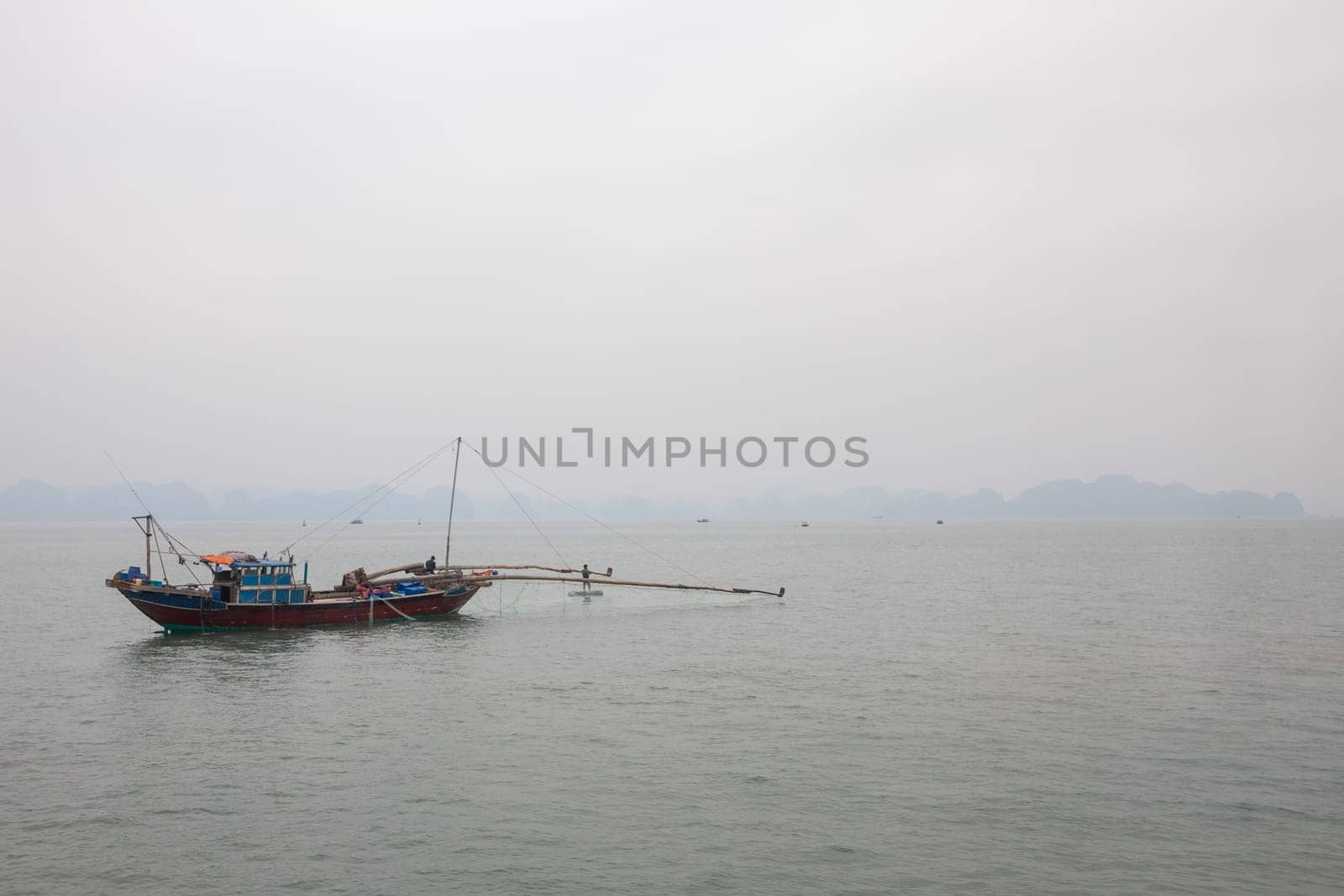 Traditional Vietnamese fishing boat on the bay