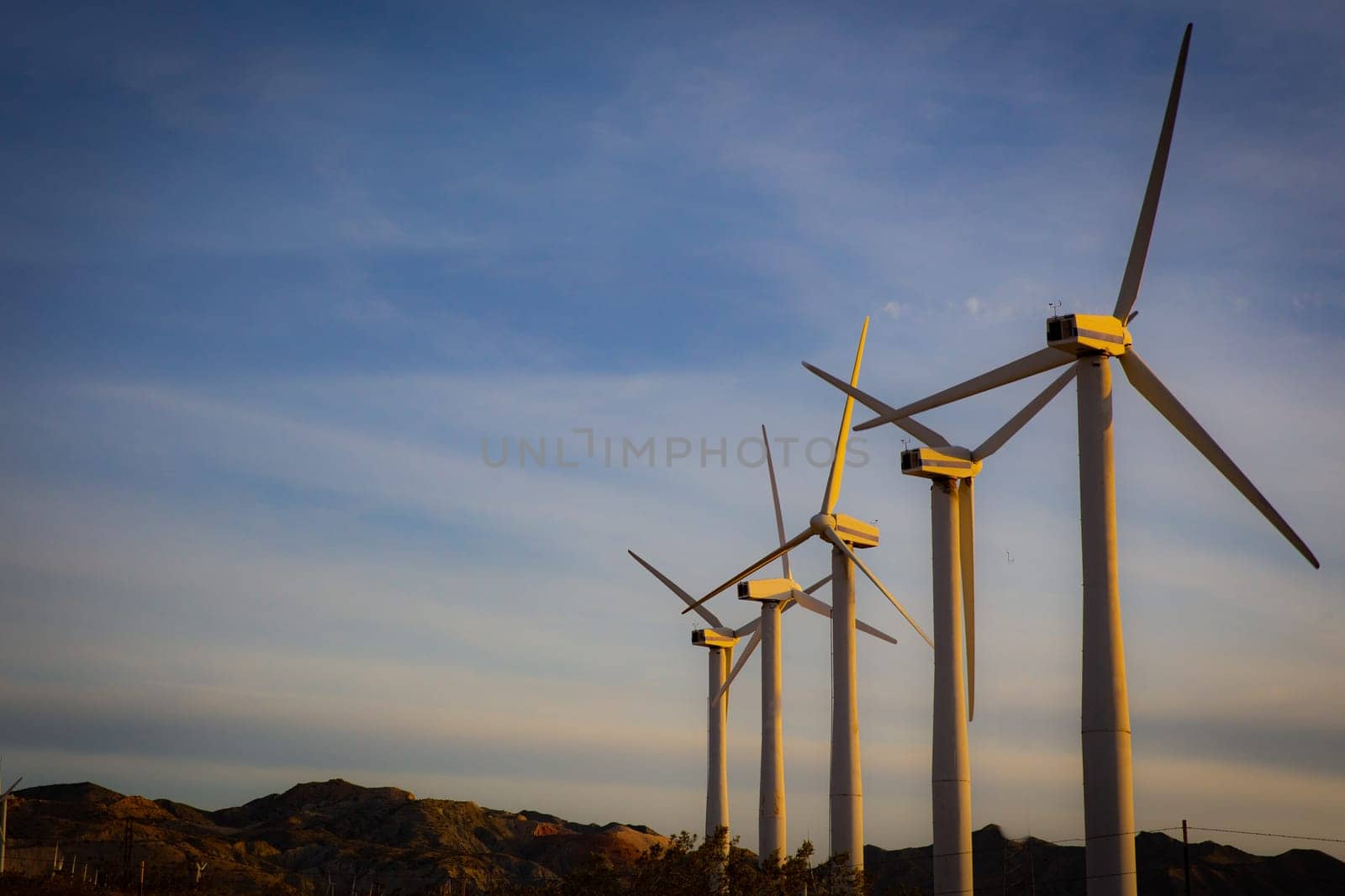 A row of Wind Turbines with Copy Space
