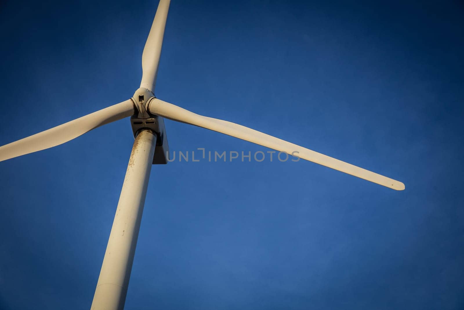 Single Wind Turbine on a clear blue sky