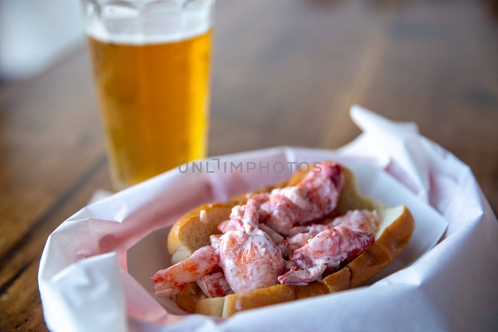 Lobster Roll and Beer at a sports bar