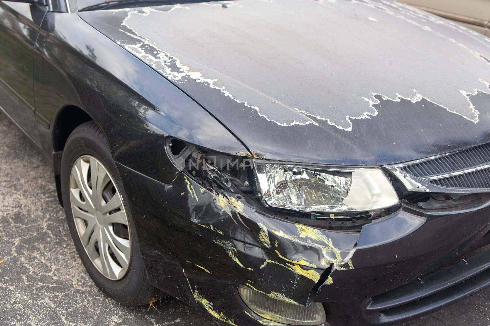 Older Car with Accident Damage on the front right side