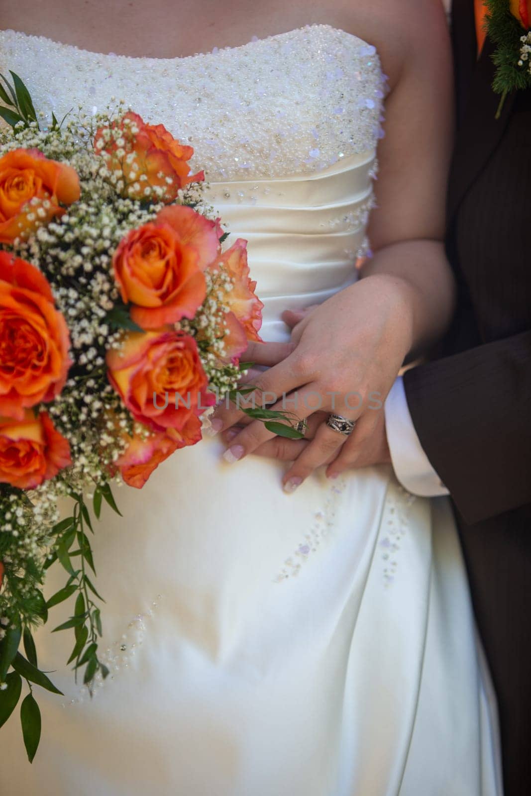 Pregnant Bride and Groom during their wedding ceremony