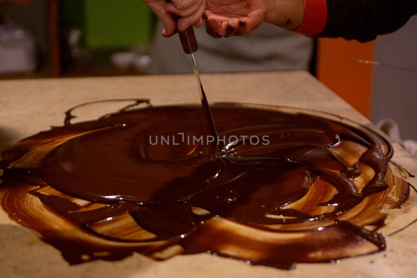 Mixing Chocolate for Tuffles by a chocolatier