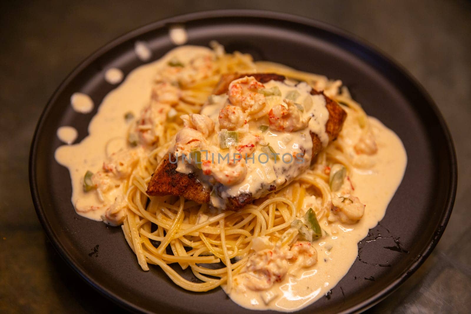 Blackened Snapper with Crawfish Pasta by TopCreativePhotography