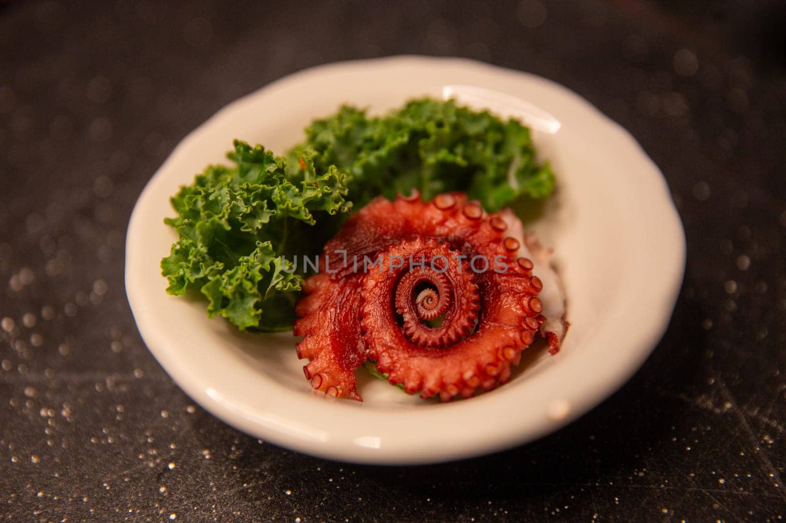 Octopus Sashimi Served in a ramekin