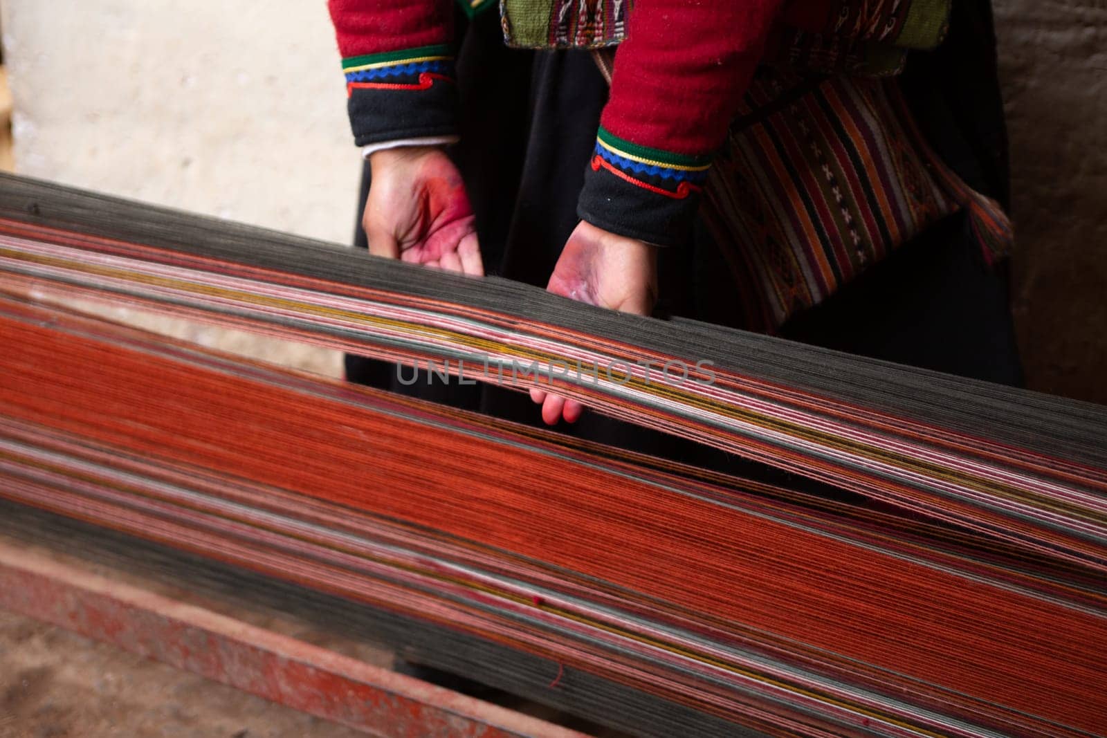 Peruvian Woman Weaving cloth to sell