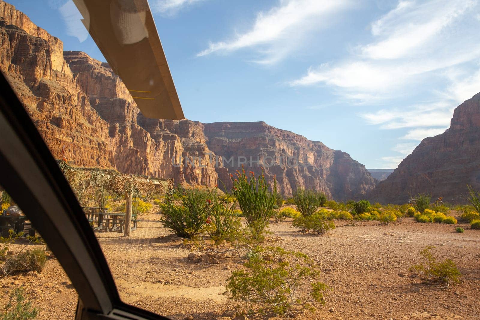Base of Grand Canyon with a landed helicopter