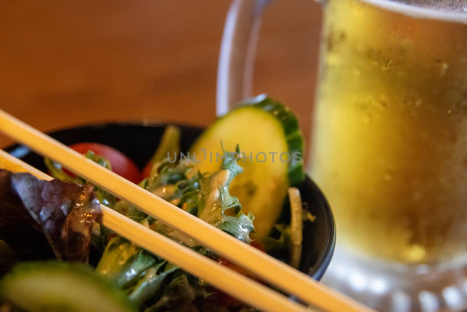 Close up of a ginger salad with beer