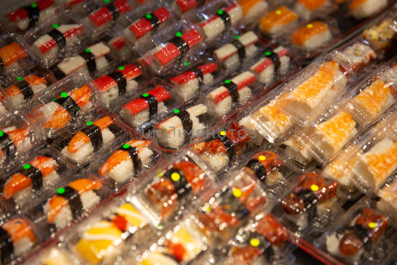 Bunch of Mini sushi on display to buy