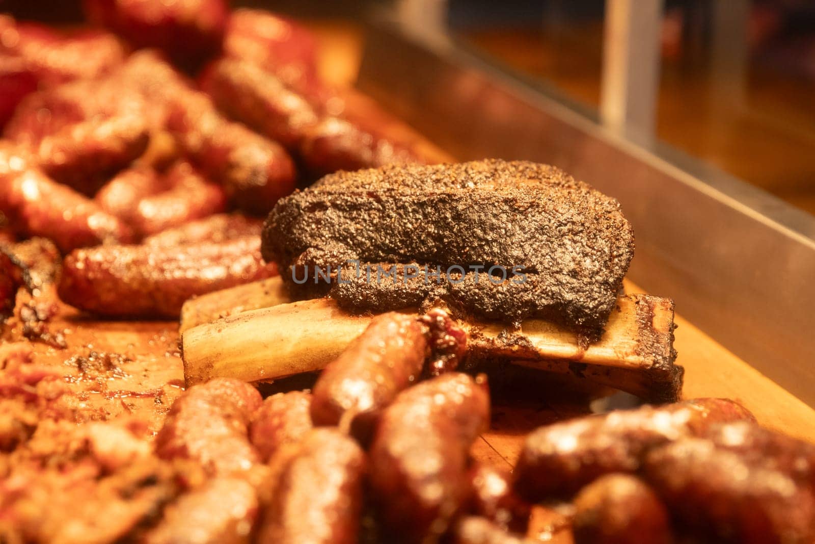 BBQ ribs under a heat lamp