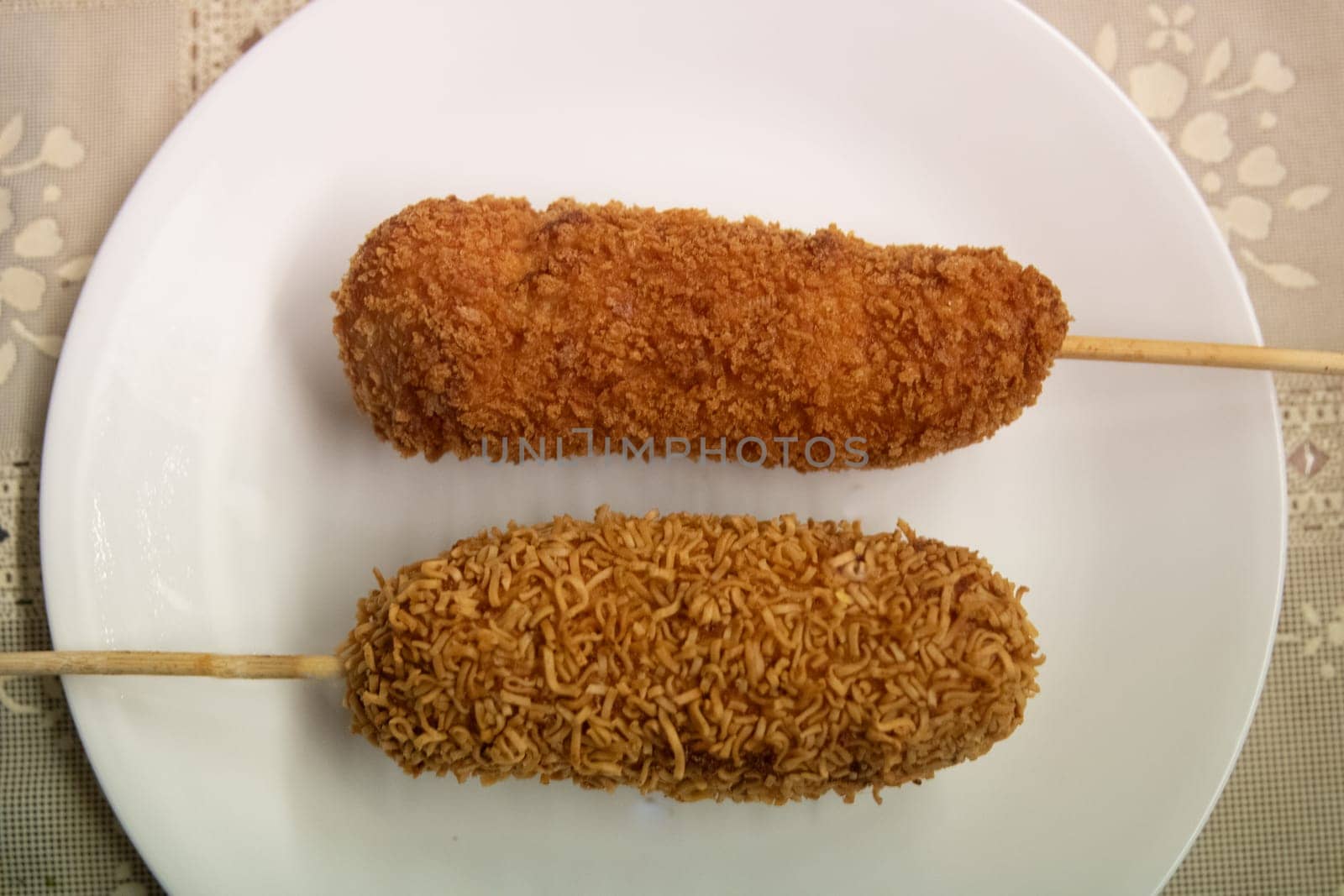 Hot Cheetos and Ramen Corn Dog on a plate