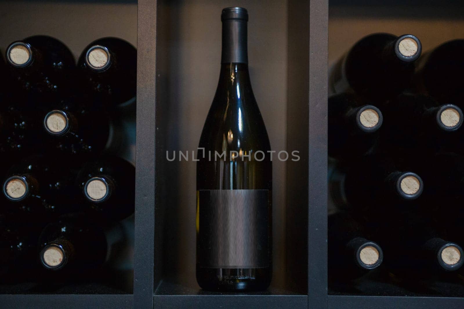 Not Labeled Red Wine Bottles on A shelf