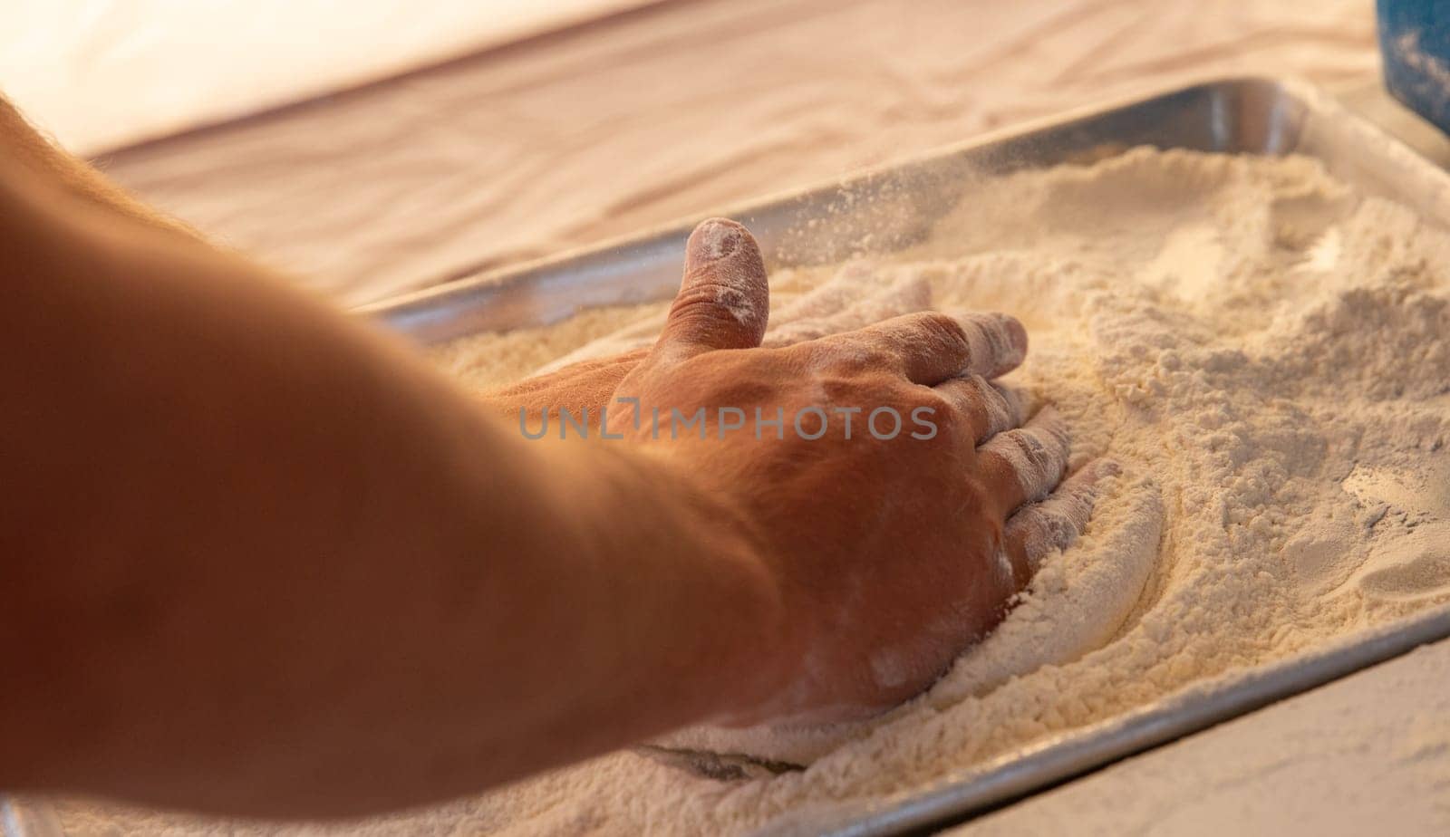Chef making dough for the crust of a pizza