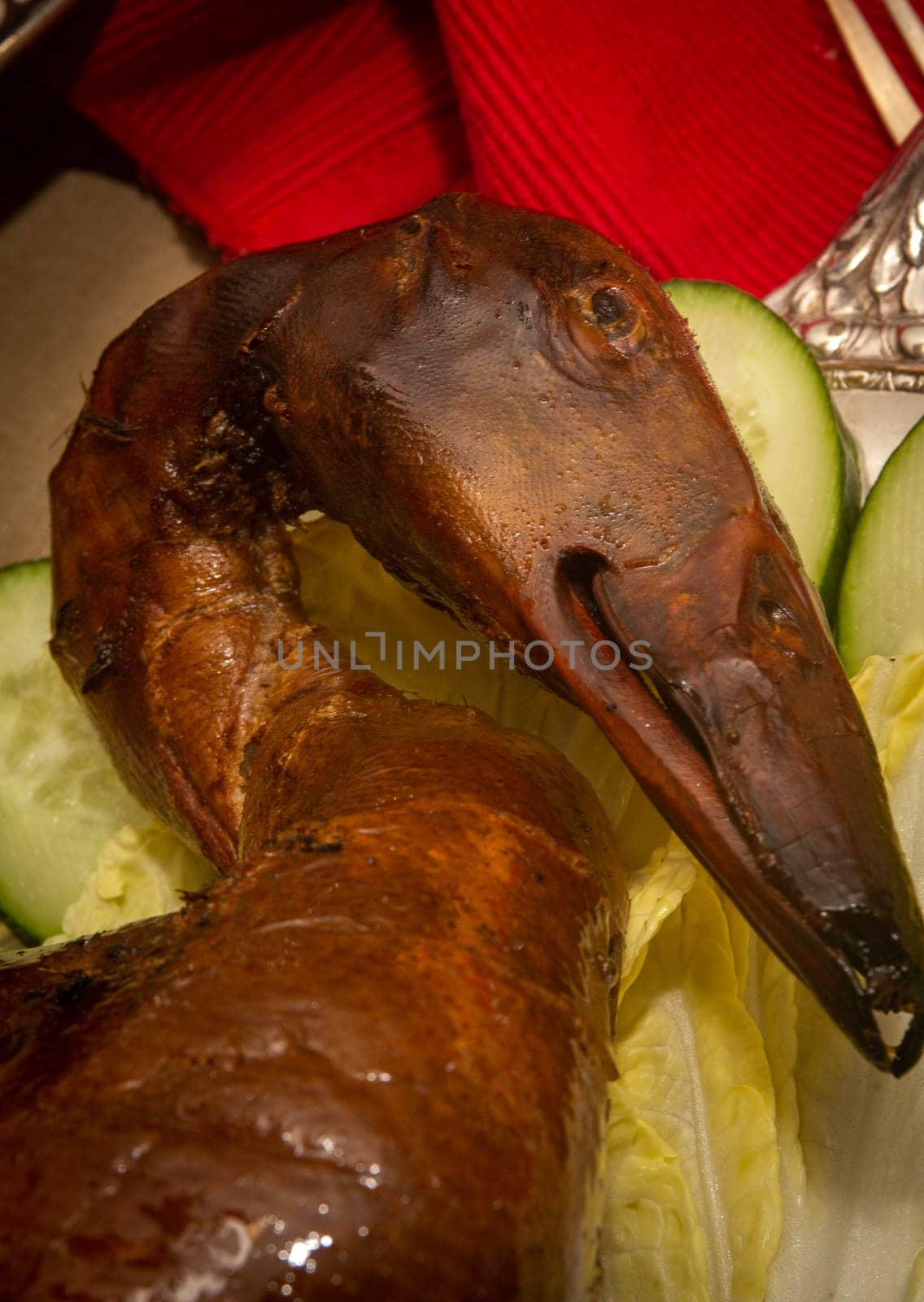 Roasted Peking Duck Head on a platter
