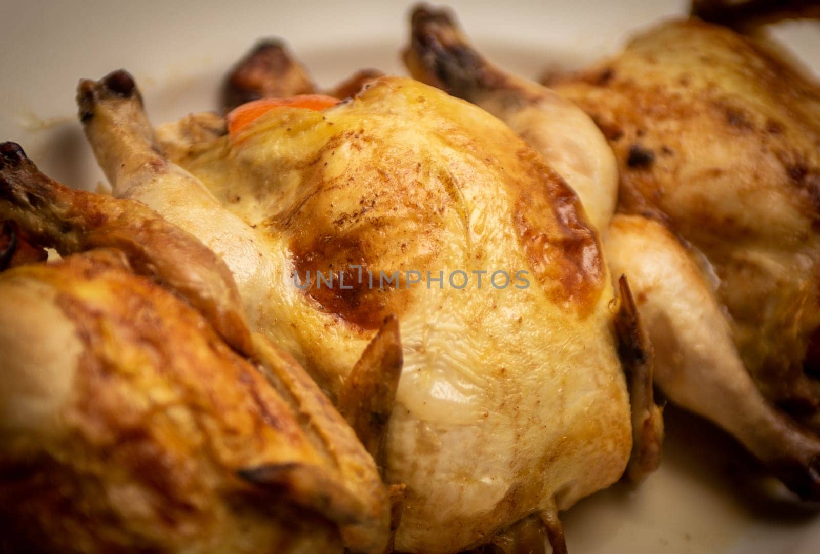Three Stuffed Roasted Chicken on a platter