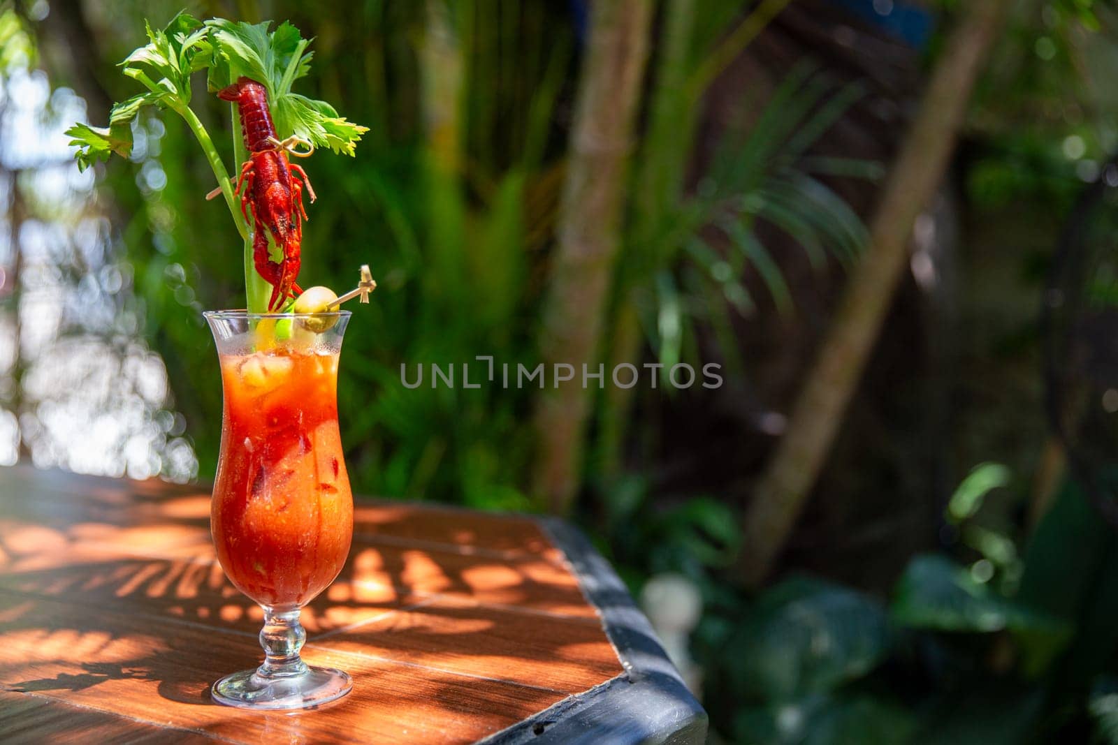 Crawfish bloody mary with celery and a frawfish