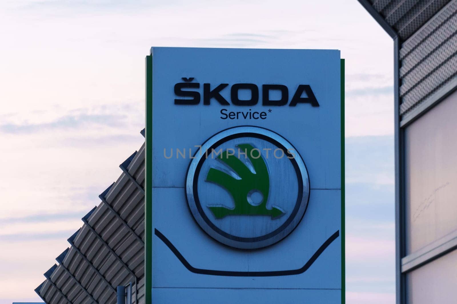 Tyumen, Russia-March 18, 2024: Skoda logo is displayed prominently in front of a commercial building, in Skoda vehicles.