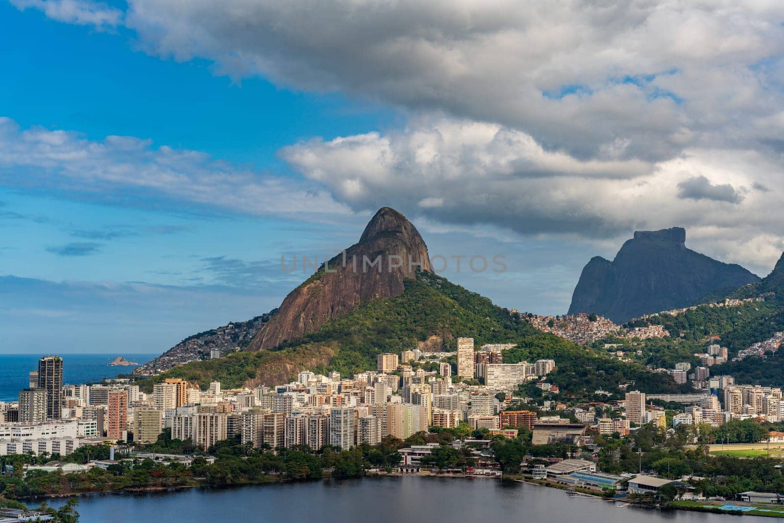 Luxury Rio skyline near Lagoa with Rocinha favela and Pedra da Gavea in sight.