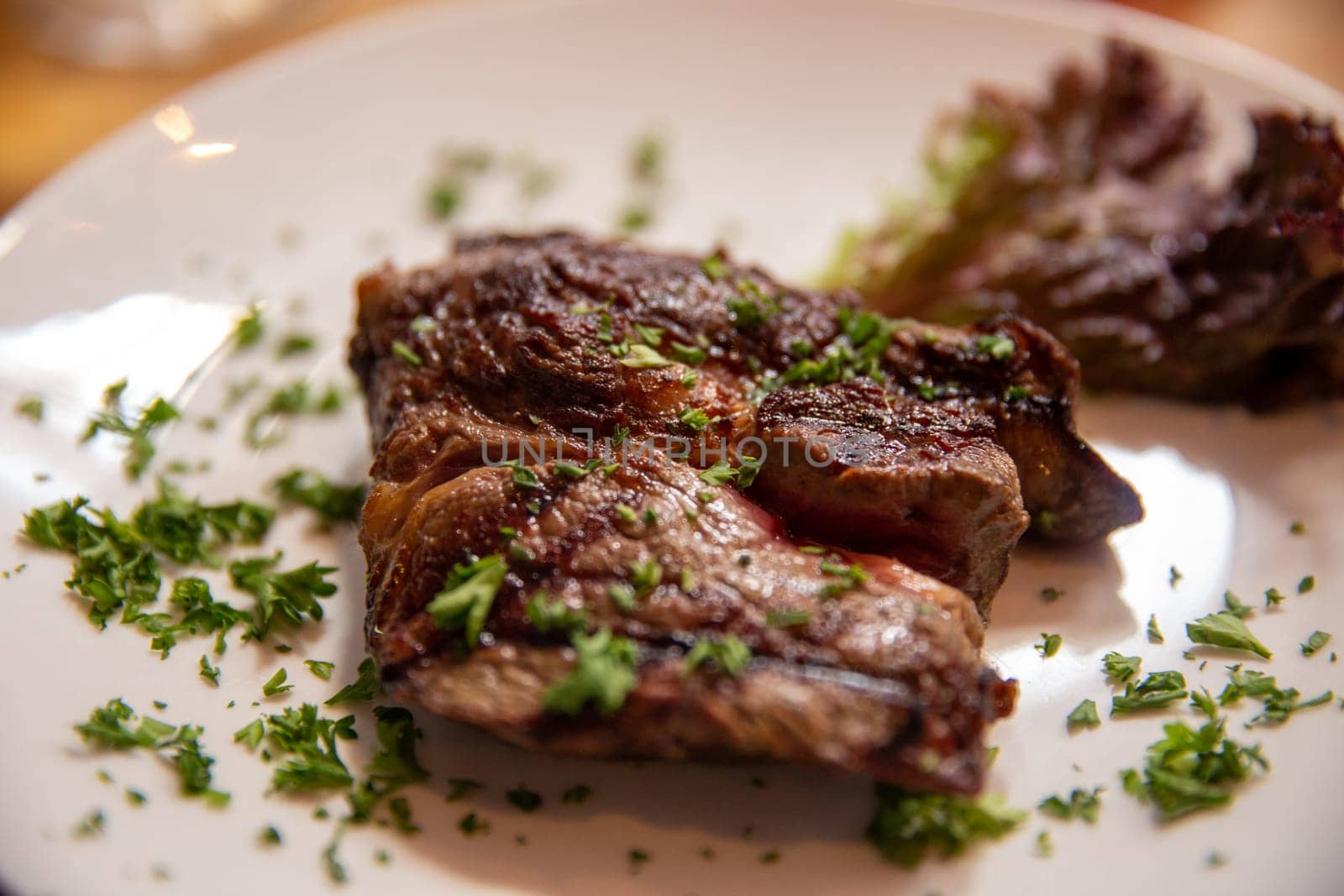 Argentinian steak with parsley garnished