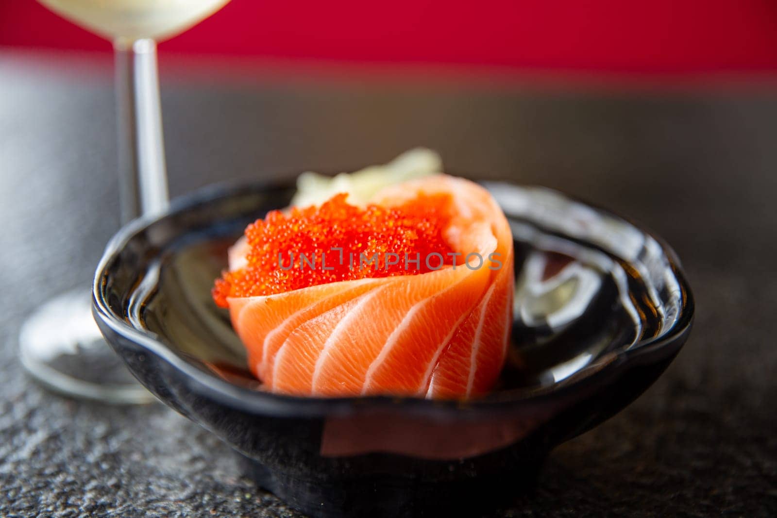 Fresh Salmon Sashimi with a glass of white wine