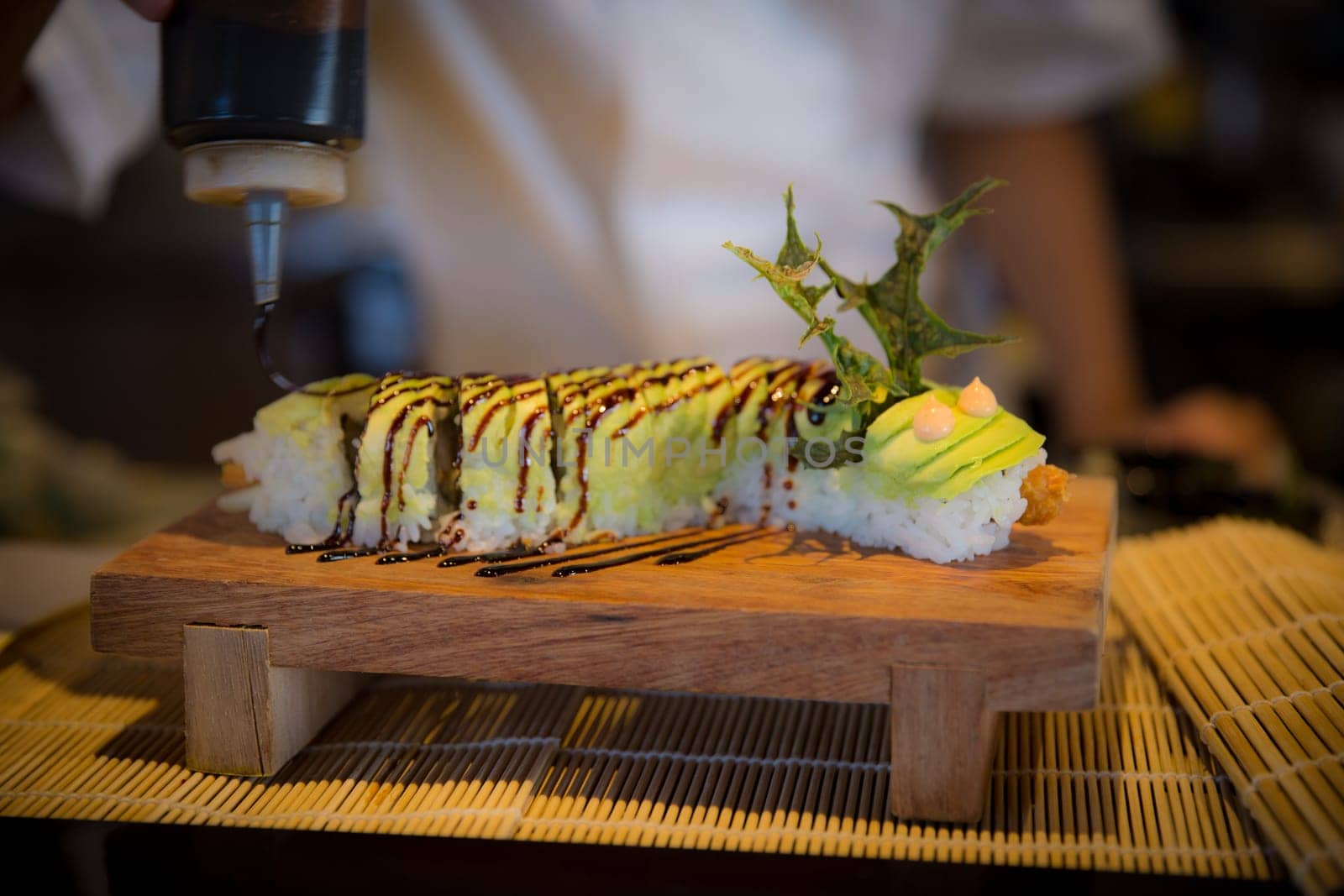 Beautiful Dragon Roll with eel sauce