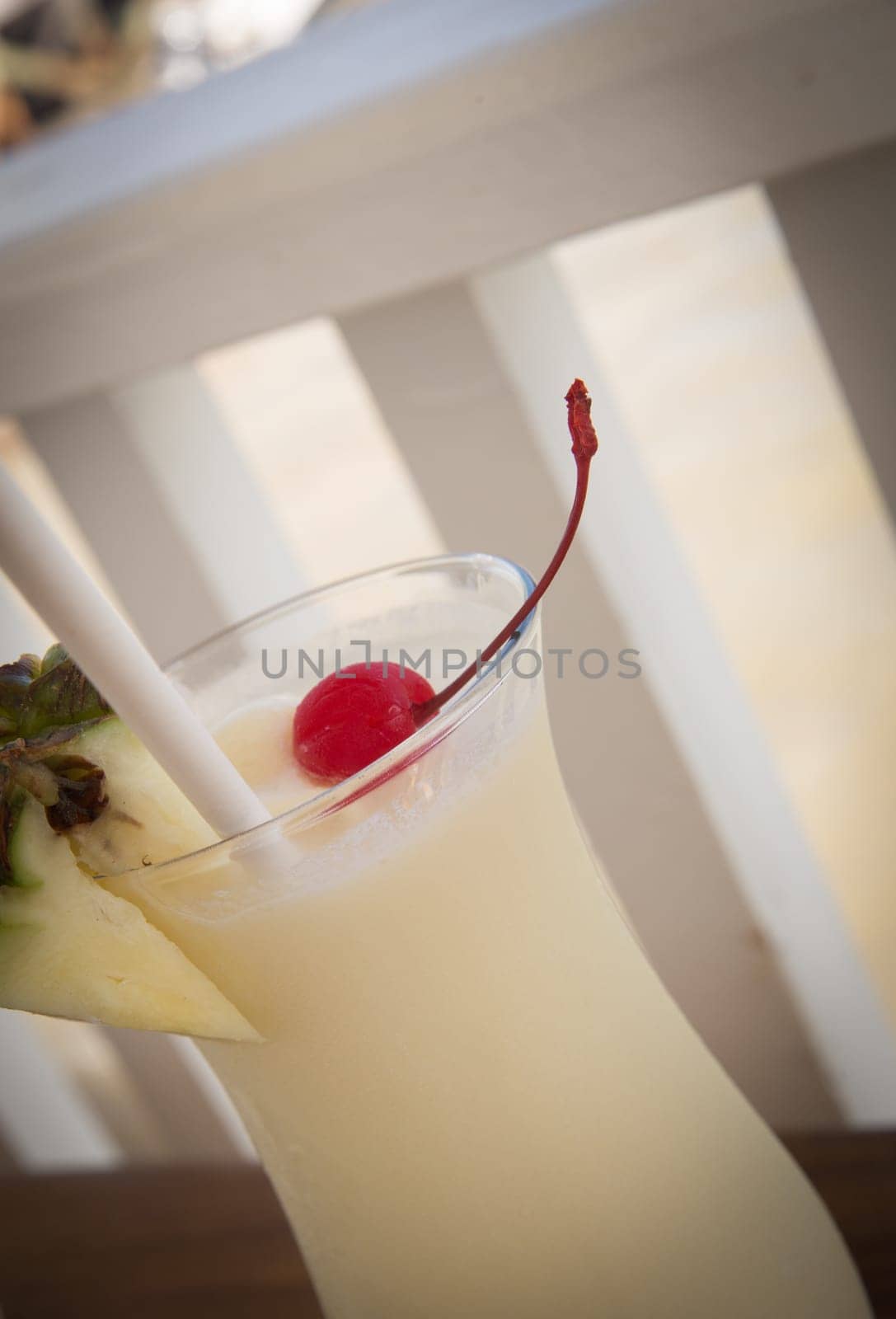 Tropical Pina Colada served with a cherry and pineapple