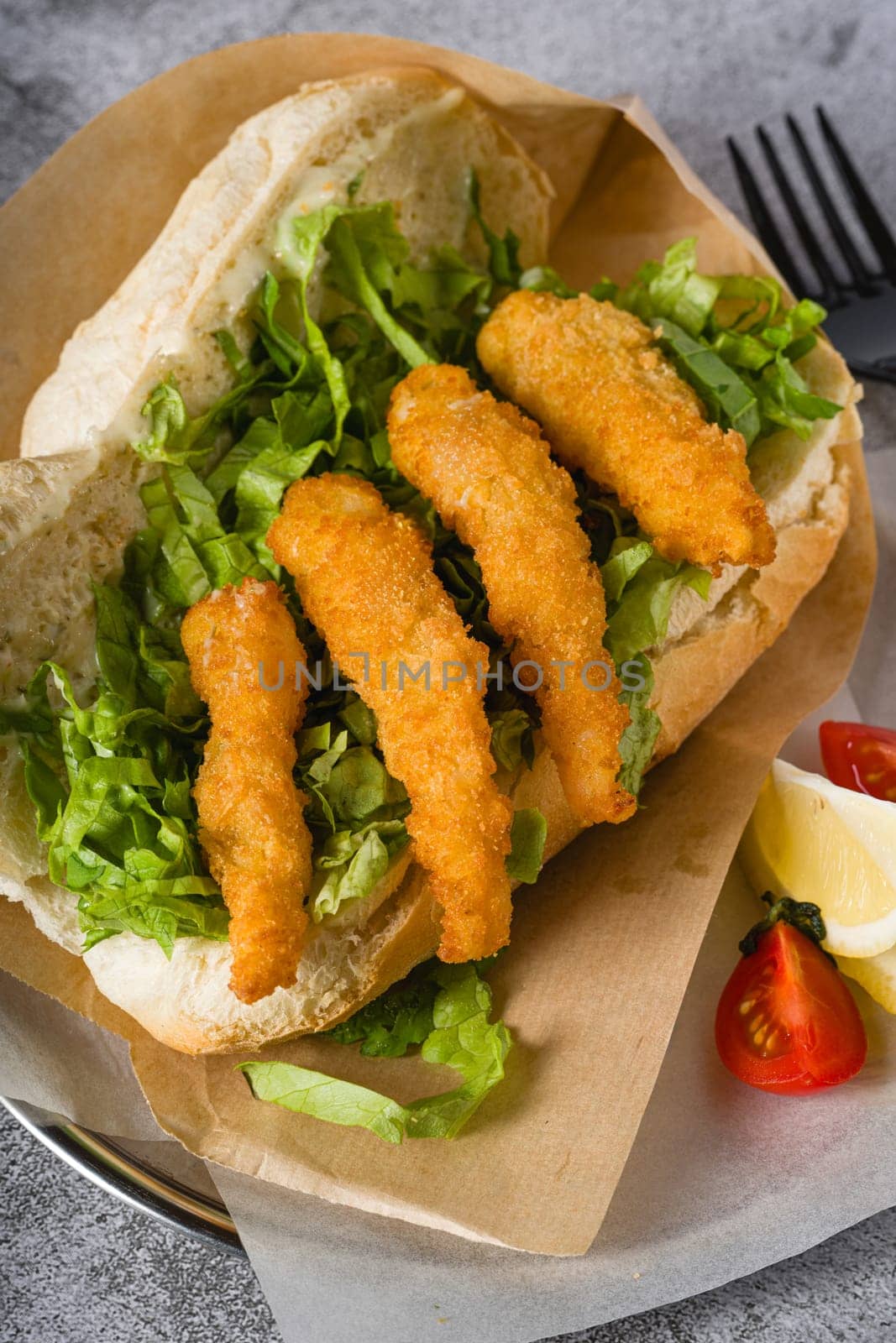 Deep fried shrimp in bread with greens on the side. Shrimp sandwich by Sonat