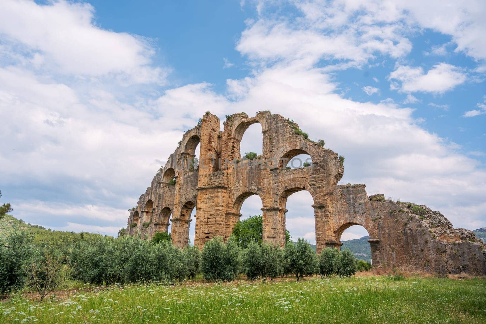 Aqueducts in the ancient city of Aspendos in Antalya, Turkey by Sonat