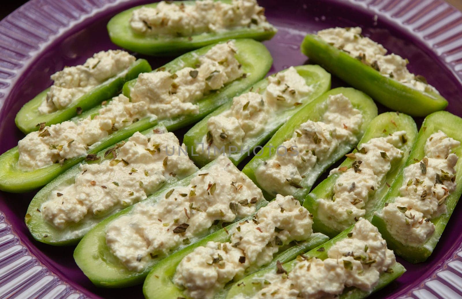 Stuffed Cucumber Appetizer with cream cheese and herbs