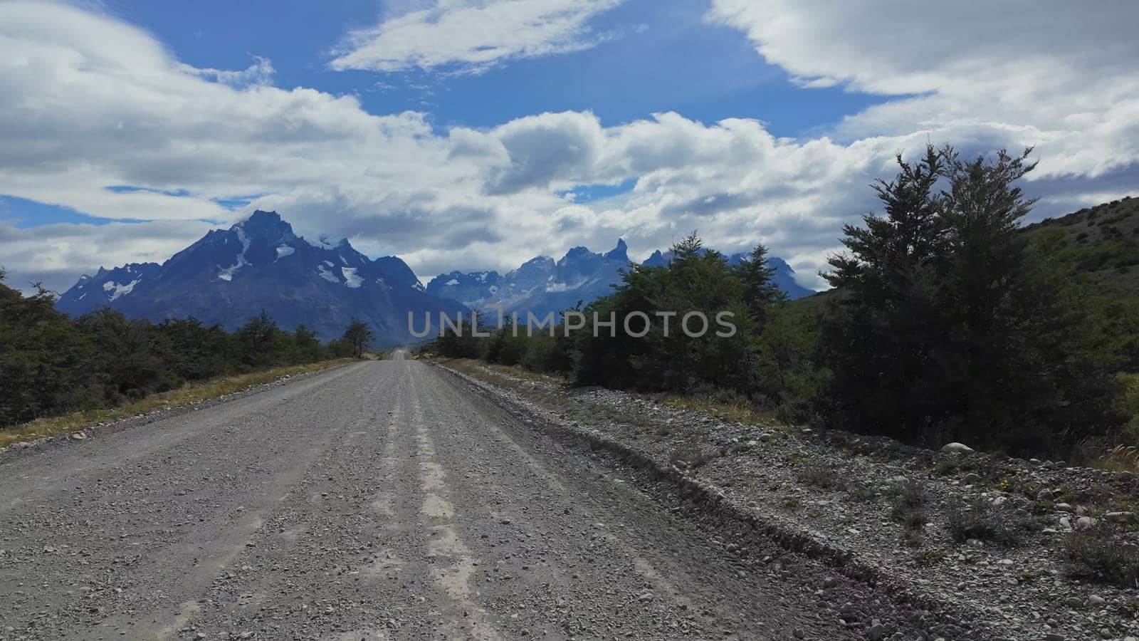 Hypnotic Hyperlapse on Gravel Road to Snowy Torres del Paine by FerradalFCG