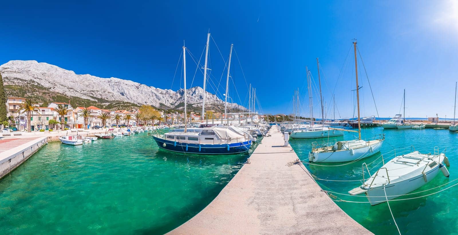 Baska voda waterfront sailing destination in Makarska riviera panoramic view by xbrchx